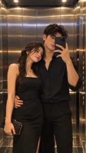 Glamorous Couple Elevator Selfie